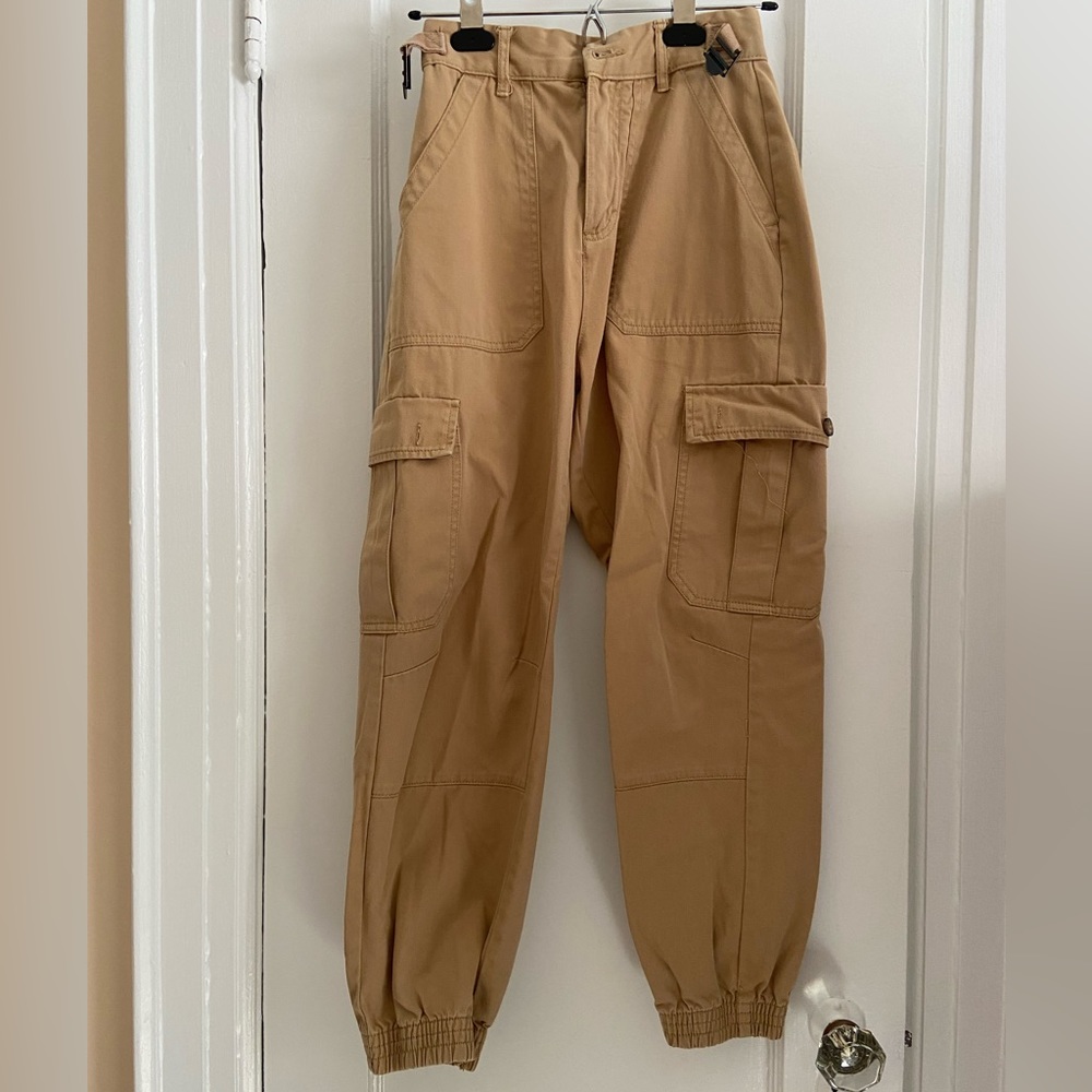 Pull&Bear cargo pants with side buckle detail.